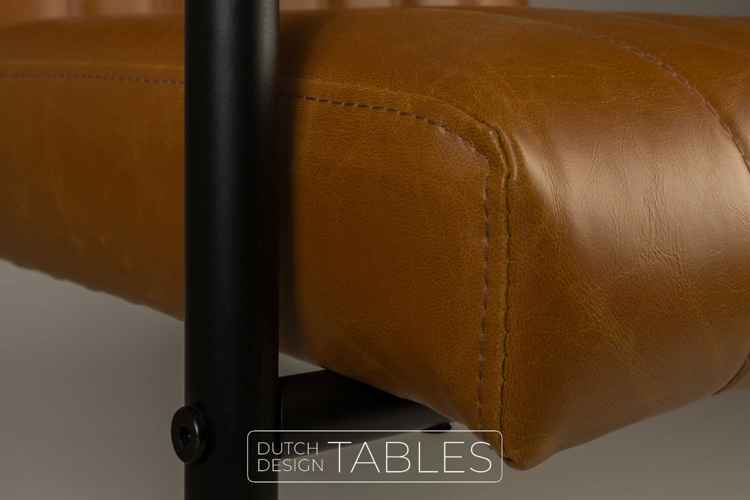 Stoel Dutchbone Stitched Cognac armchair Dutch Design Tables