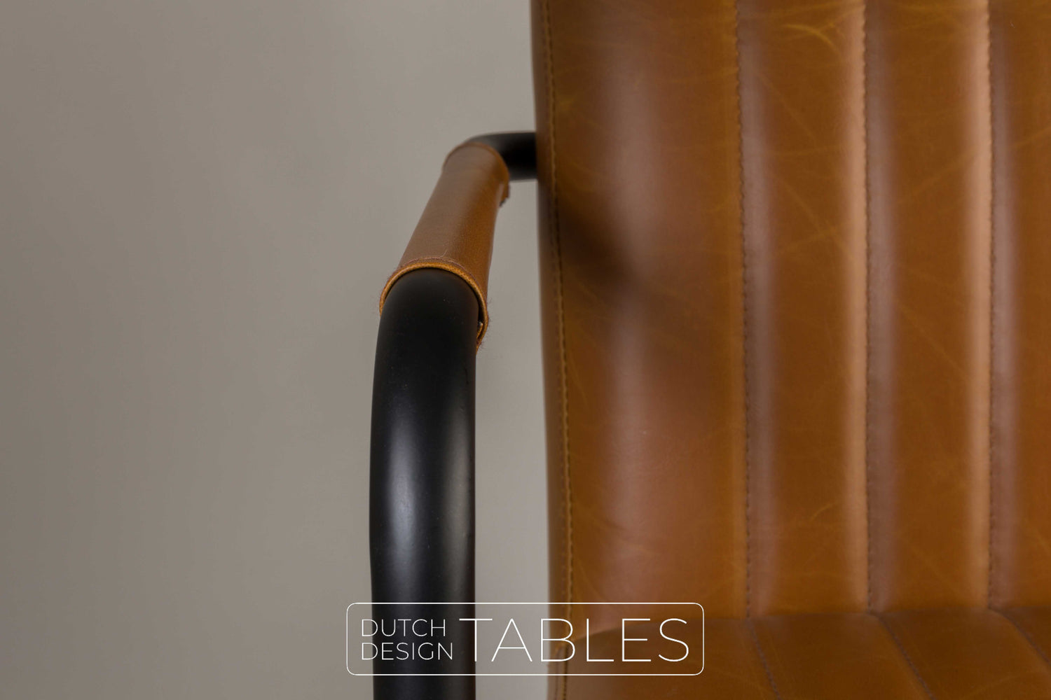 Stoel Dutchbone Stitched Cognac armchair Dutch Design Tables